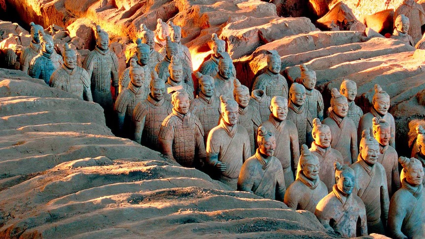 Terracotta Army warriors in Xi’an, illuminated by warm light